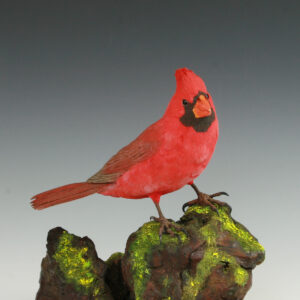 Hand Carved Cardinal on Mossy Manzanita